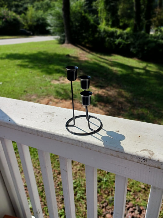 Triple tapered candle holder