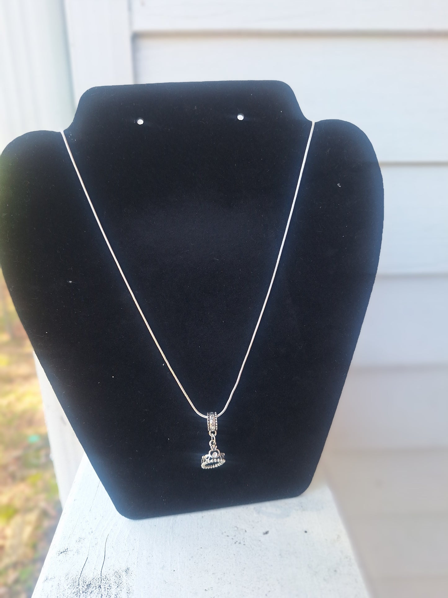 Rope style necklace with pandora style charm