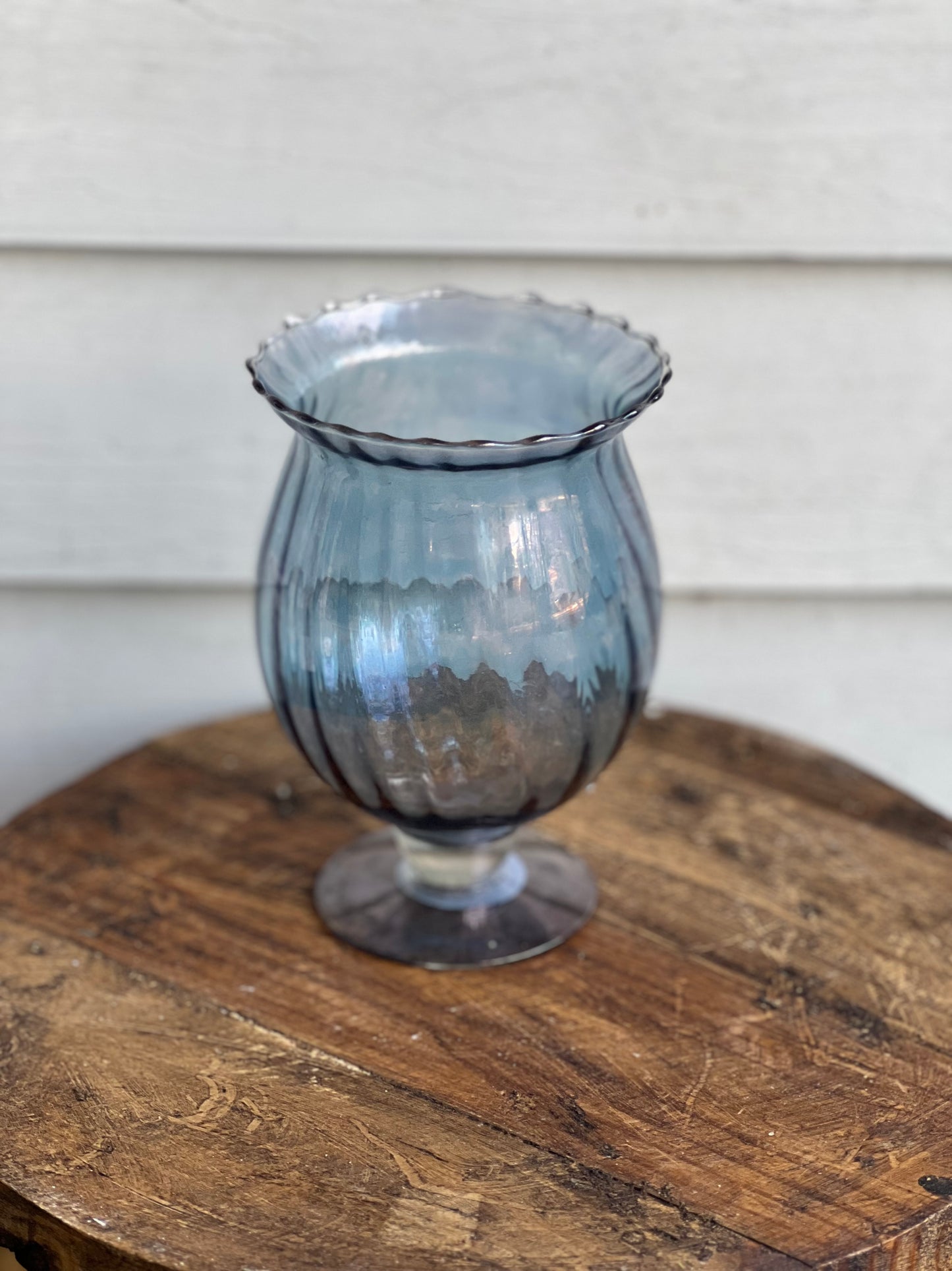 Small blue glass vase