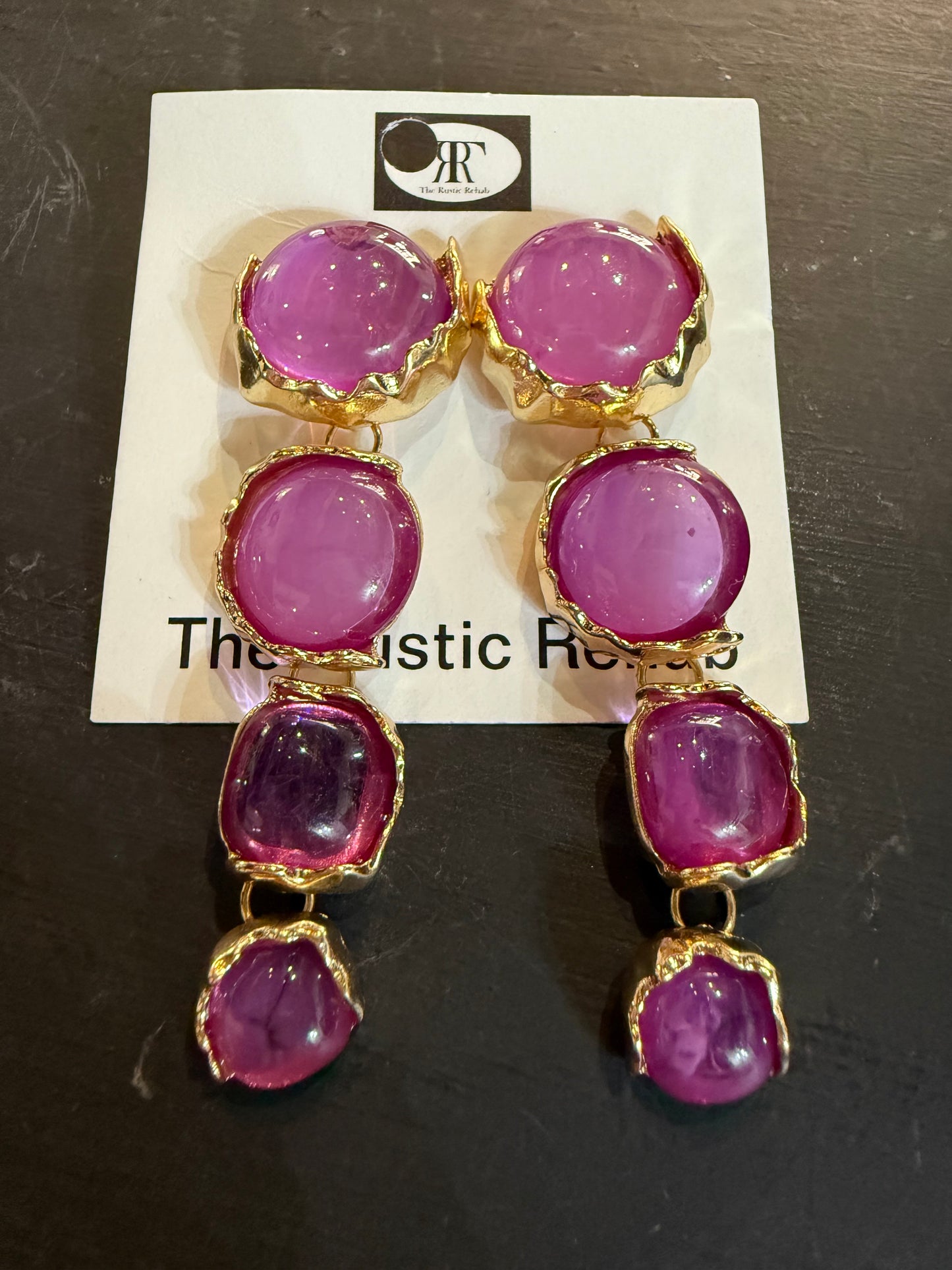 Purple stone with gold earrings