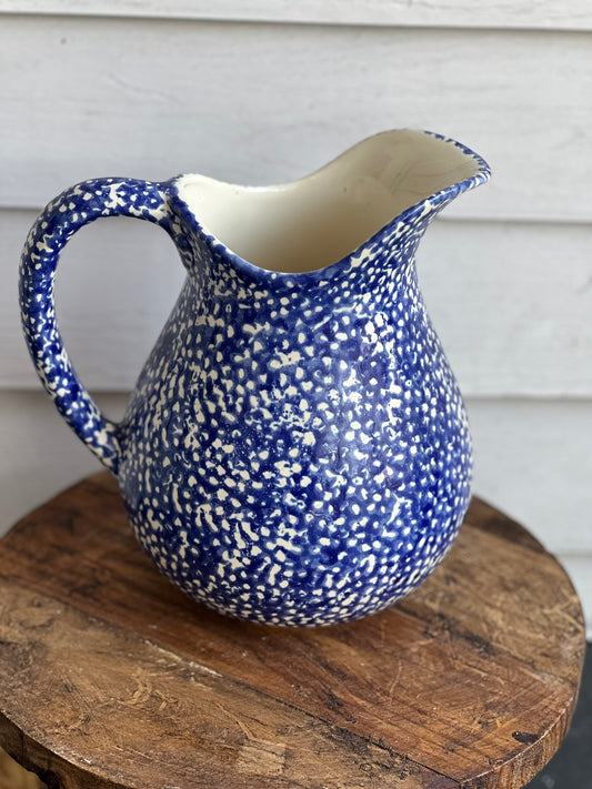 Cream and blue pitcher