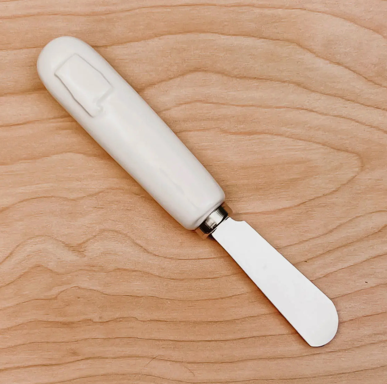 White Alabama embossed spreader