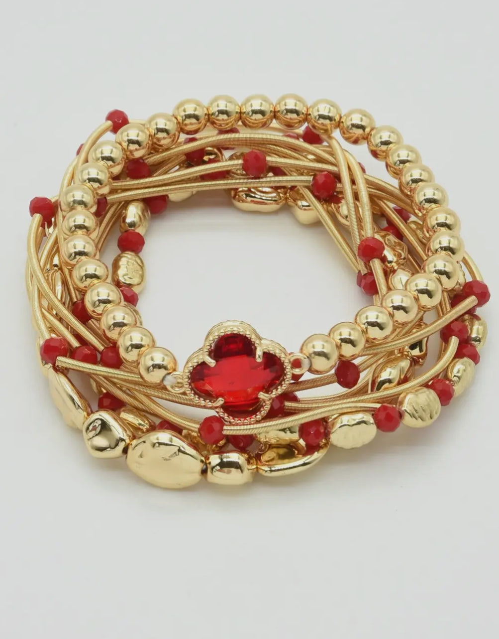 Gold stretch bracelet with red