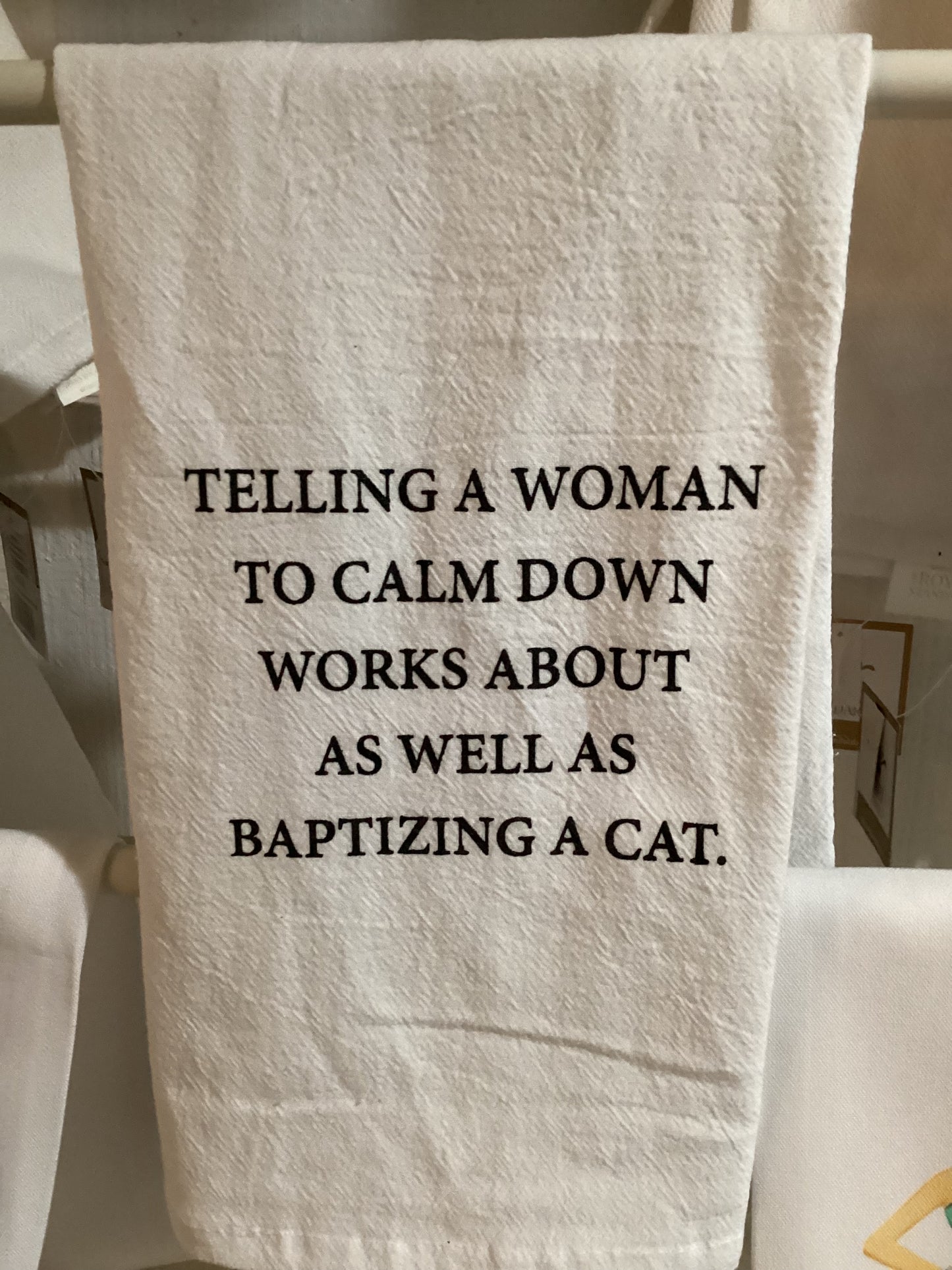 Baptizing a cat tea towl