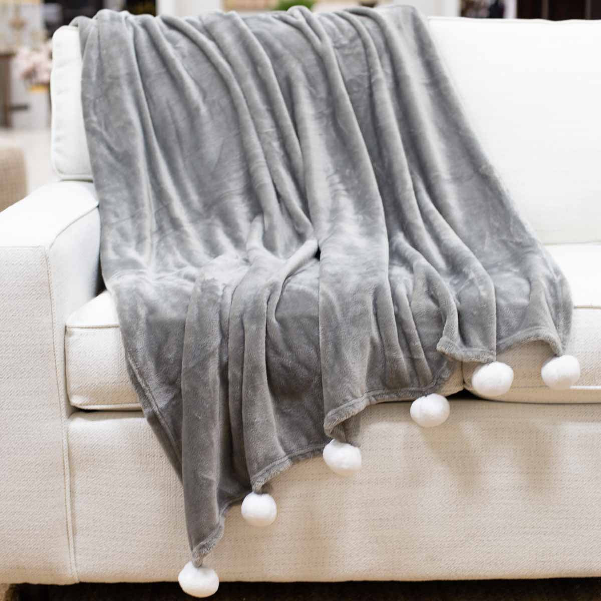 Pom Pom gray throw