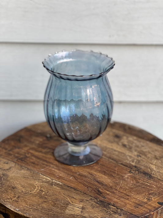 Small blue glass vase