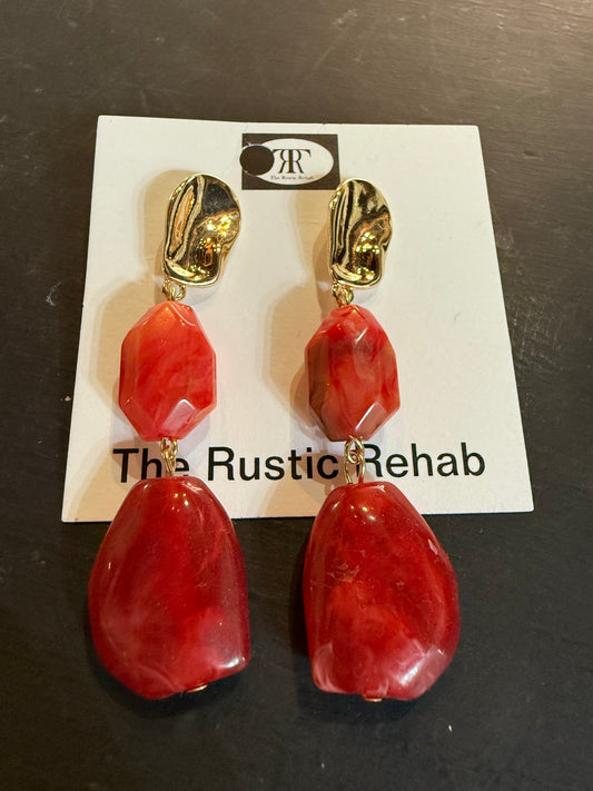 Red stone with gold earrings