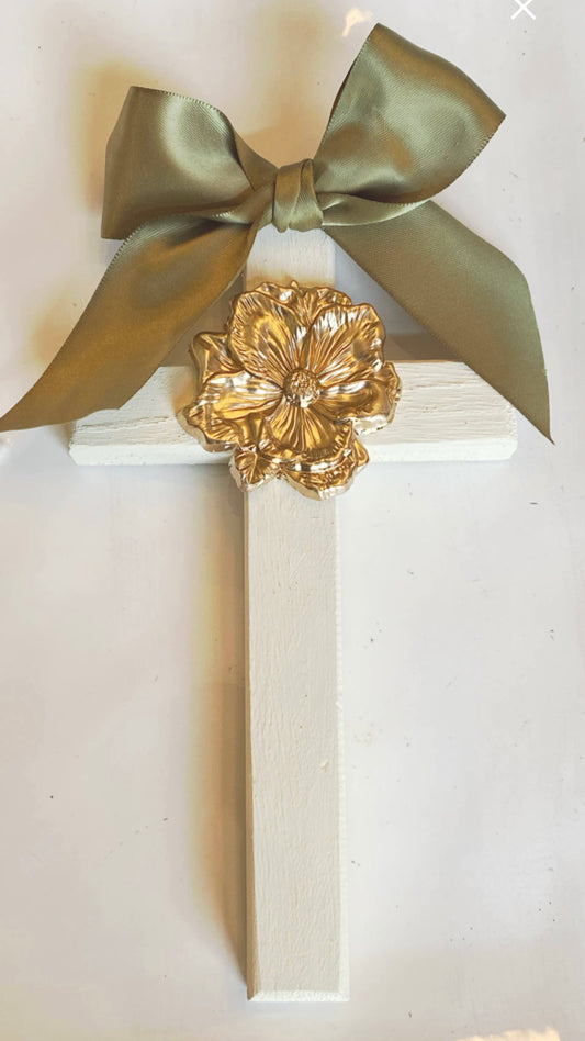 Wooden cross with gilded magnolia